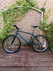 carrera axle mens hybrid bike review